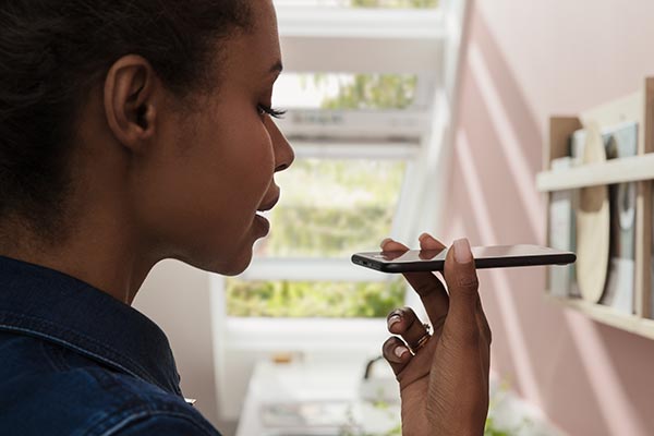 VELUX app control woman in kitchen